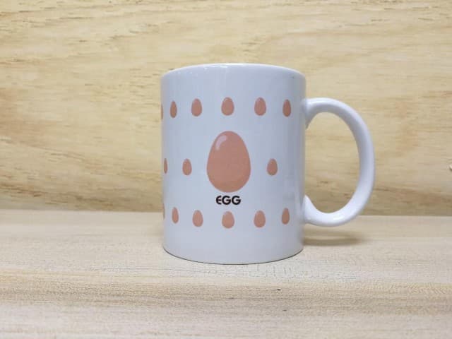 สกรีนแก้วมัคสีขาวรูปเเละข้อความ EGG | รับสกรีนโลโก้ ไม่มีขั้นต่ำ 1 ชิ้นก็ทำได้